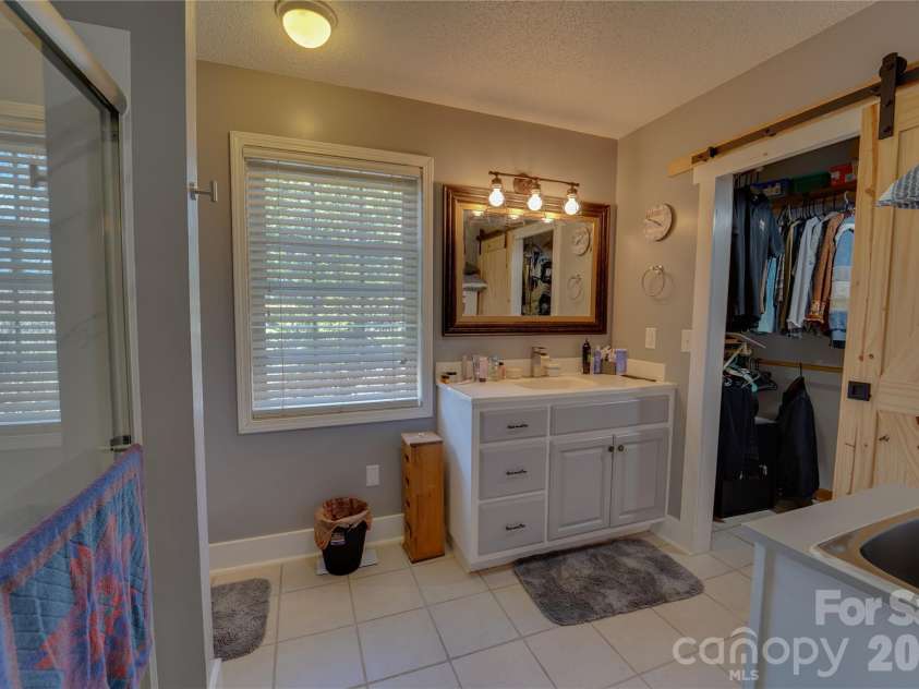 335 Icenhower Road, Leicester, NC 28748.  MLS# CAR4361299, YatesRealty ID 23982. 