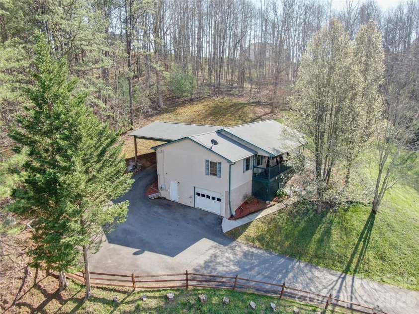 335 Icenhower Road, Leicester, NC 28748.  MLS# CAR4361299, YatesRealty ID 23982. 