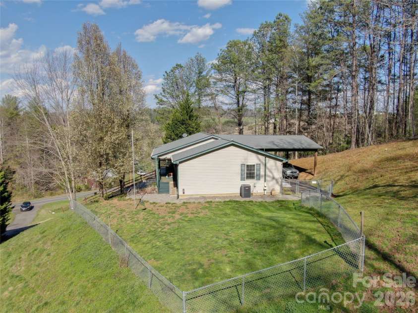 335 Icenhower Road, Leicester, NC 28748.  MLS# CAR4361299, YatesRealty ID 23982. 