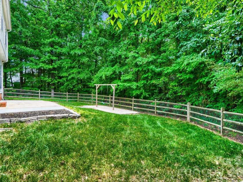 6408 Fillian Lane, Charlotte, NC 28269.  MLS# CAR4374628, YatesRealty ID 23984. Fully Fenced Yard