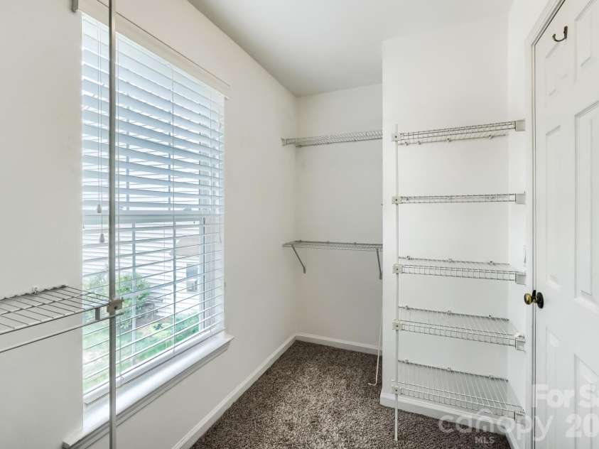 6408 Fillian Lane, Charlotte, NC 28269.  MLS# CAR4374628, YatesRealty ID 23984. Large Walk-In Closet with WINDOW!