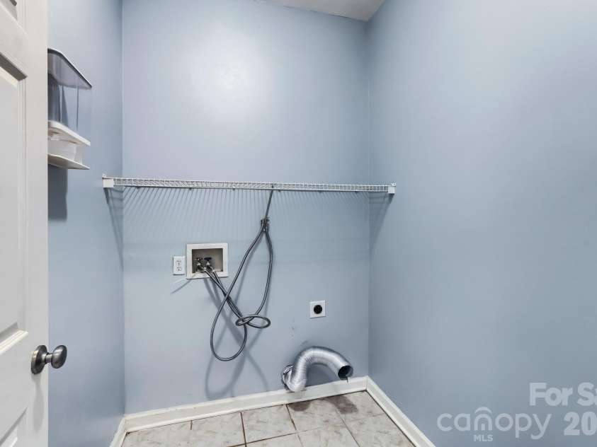 6408 Fillian Lane, Charlotte, NC 28269.  MLS# CAR4374628, YatesRealty ID 23984. Laundry Room 
