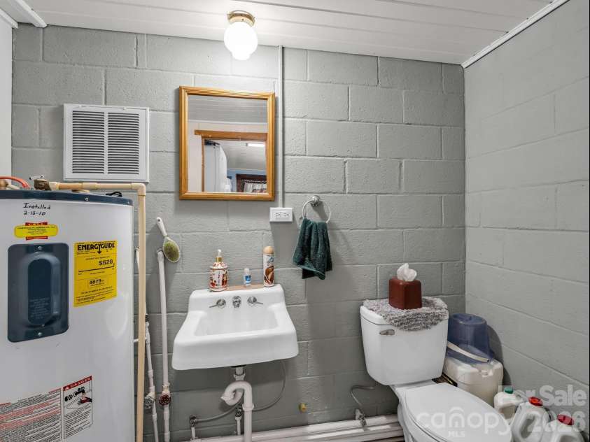 408 Hollis Road, Ellenboro, NC 28040.  MLS# CAR4379157, YatesRealty ID 23986. 1/2 bath in basement