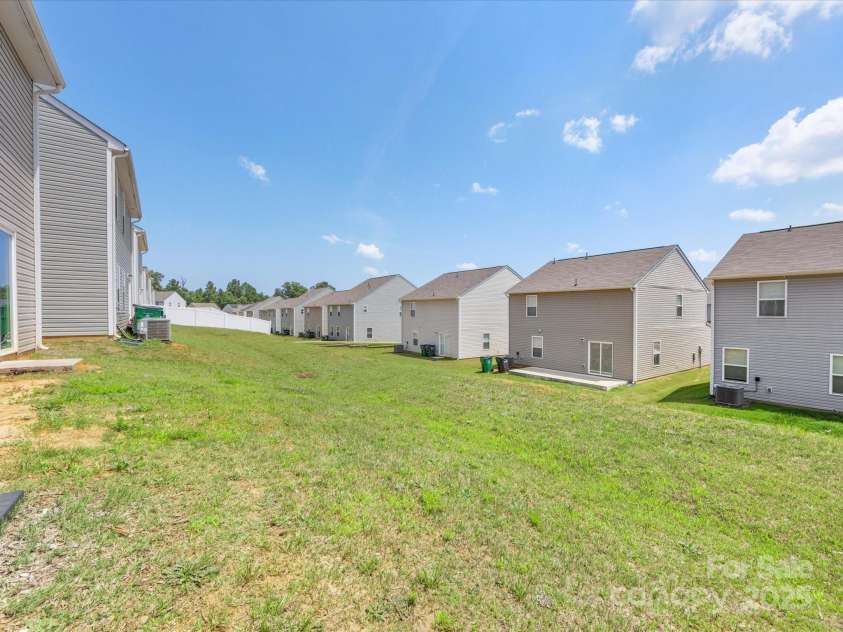 9136 Creedmore Hills Drive, Charlotte, NC 28214.  MLS# CAR4274108, YatesRealty ID 23986. Backyard