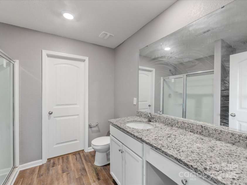 9136 Creedmore Hills Drive, Charlotte, NC 28214.  MLS# CAR4274108, YatesRealty ID 23986. Primary Bathroom