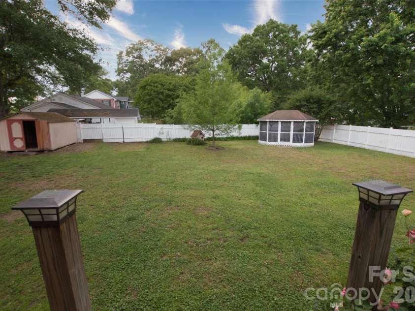 204 Clinton Avenue, Clover, SC 29710.  MLS# CAR4376865, YatesRealty ID 23987. Backyard w/ Gazebo and Shed