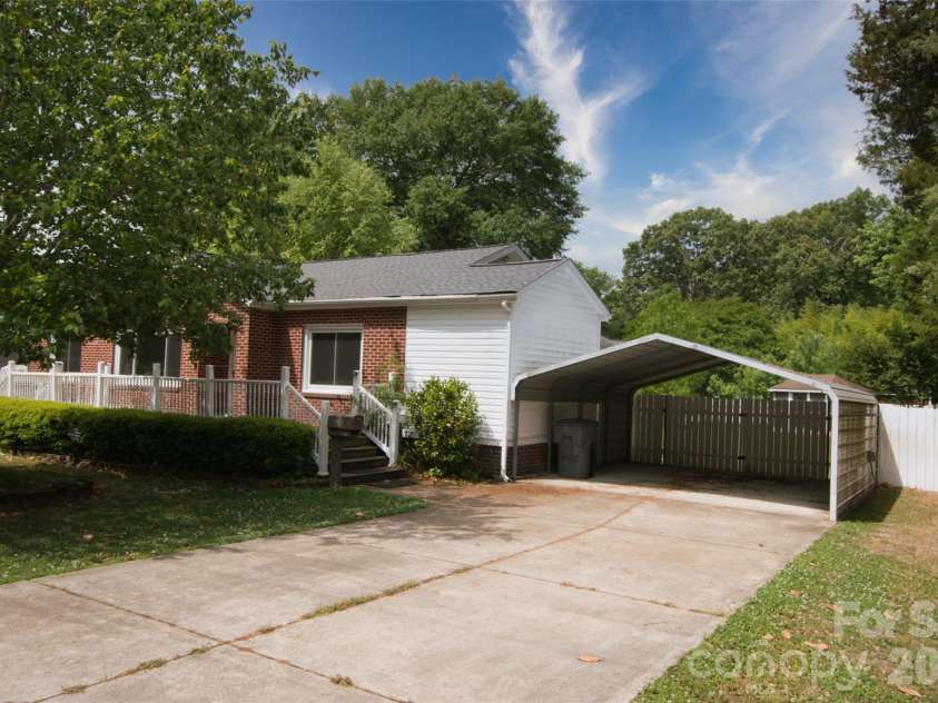 204 Clinton Avenue, Clover, SC 29710.  MLS# CAR4376865, YatesRealty ID 23987. Carport