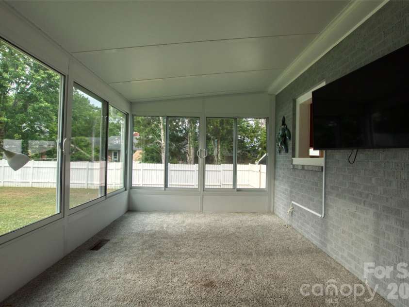 204 Clinton Avenue, Clover, SC 29710.  MLS# CAR4376865, YatesRealty ID 23987. Sunroom 