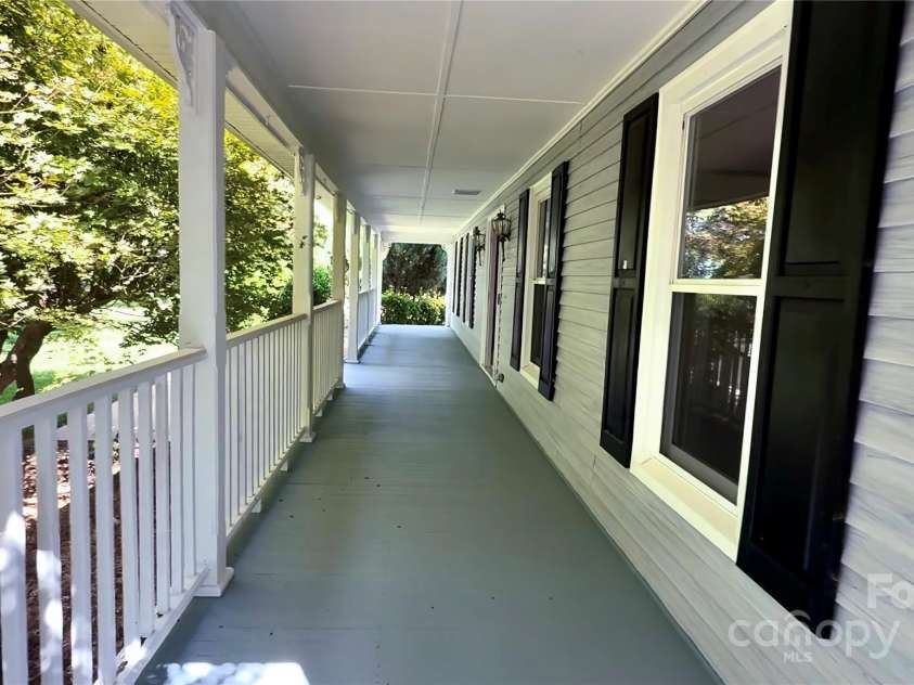 5632 Zion Church Road, Concord, NC 28025.  MLS# CAR4270566, YatesRealty ID 23988. Huge Covered Front Porch