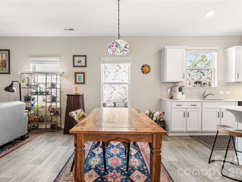 43 Cobbler Drive, Peachland, NC 28133.  MLS# CAR4377302, YatesRealty ID 23989. Open dining area provides a seamless extension of the kitchen and living room.