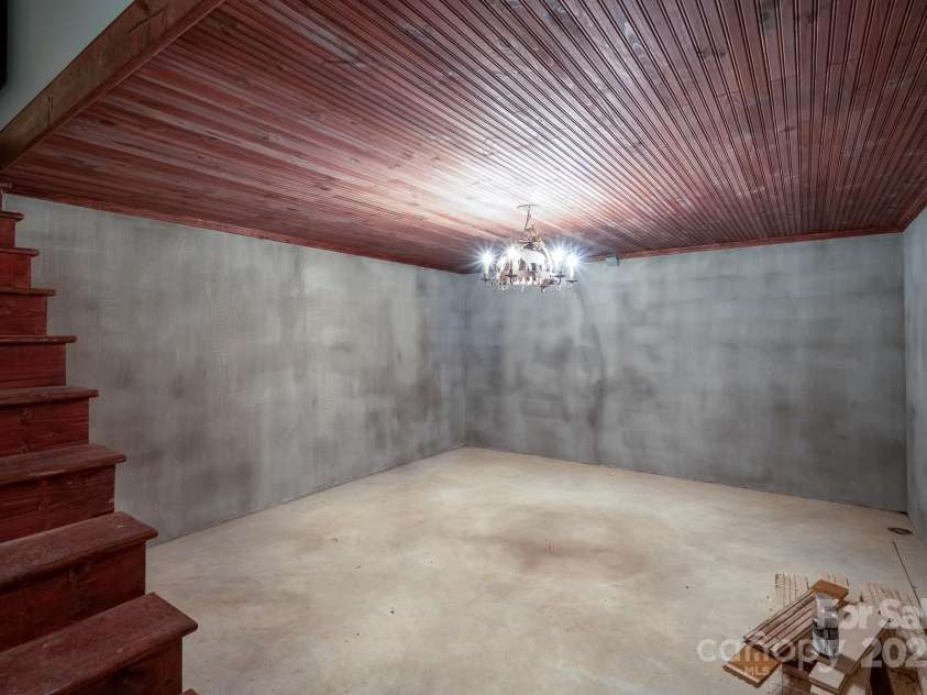 139 Deerfield Lane, New London, NC 28127.  MLS# CAR4295568, YatesRealty ID 2399. Lower Level Storage Area