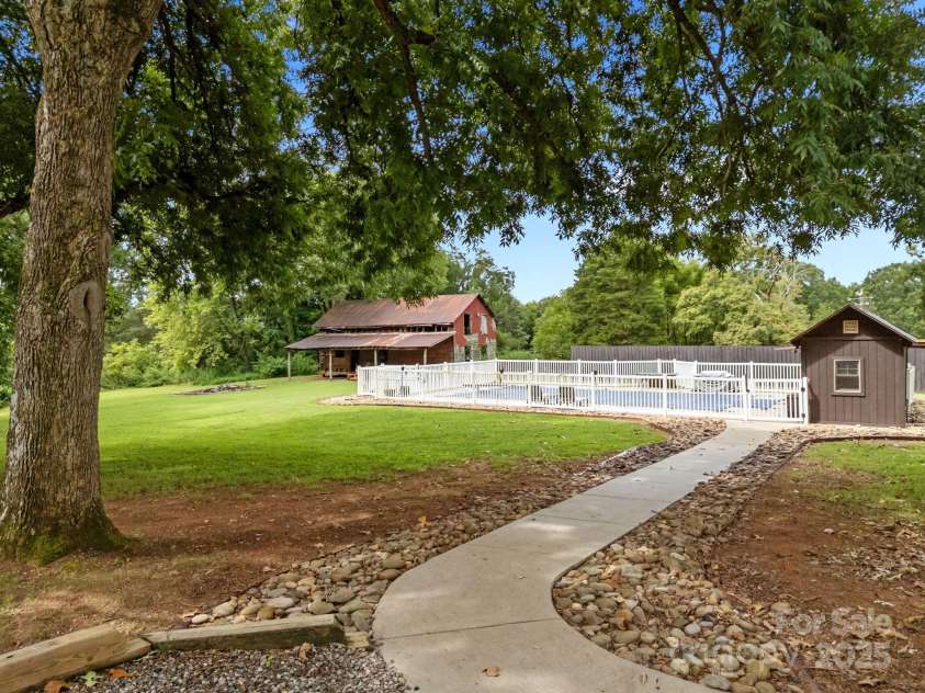 8900 Old Concord Road, Salisbury, NC 28146.  MLS# CAR4295325, YatesRealty ID 2399. Fenced pool area