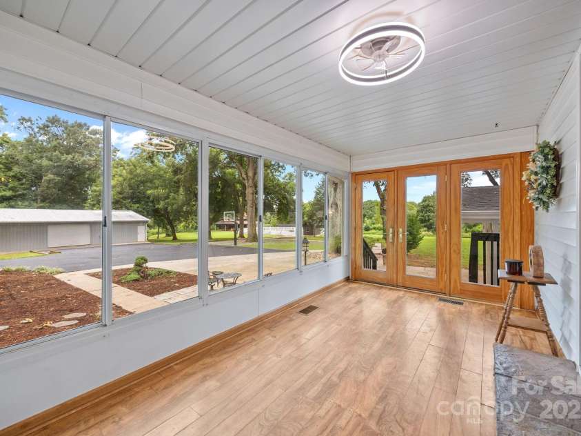 8900 Old Concord Road, Salisbury, NC 28146.  MLS# CAR4295325, YatesRealty ID 2399. Sunroom overlooking your beautiful 6 acres!