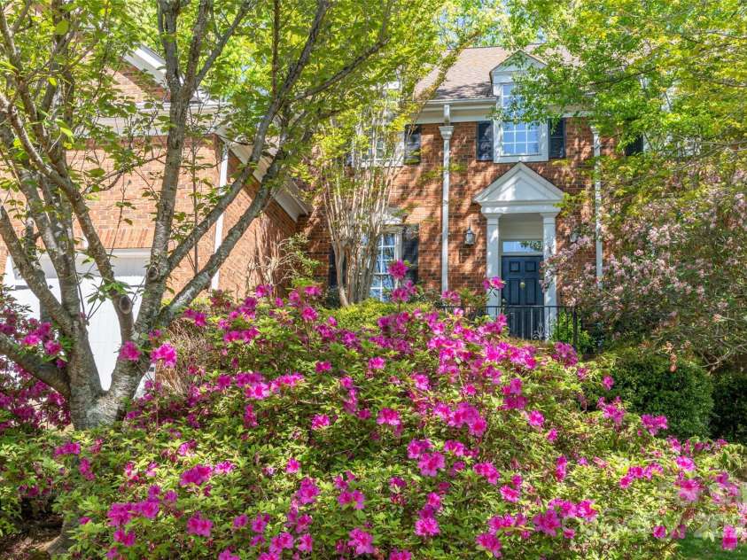 19113 Southport Drive, Cornelius, NC 28031.  MLS# CAR4242642, YatesRealty ID 23990. Custom detailed Pediment entryway