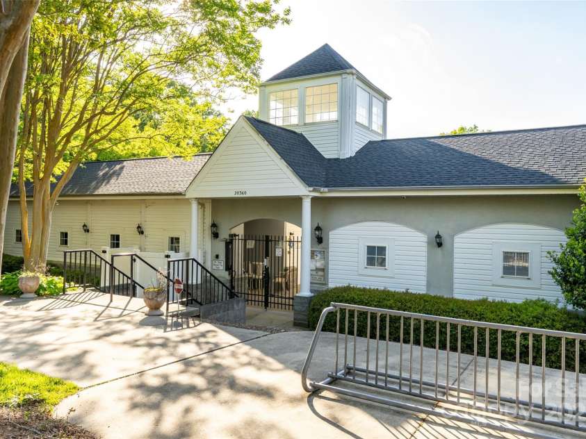 19113 Southport Drive, Cornelius, NC 28031.  MLS# CAR4242642, YatesRealty ID 23990. Drive your Golf cart down to the pool with ample parking