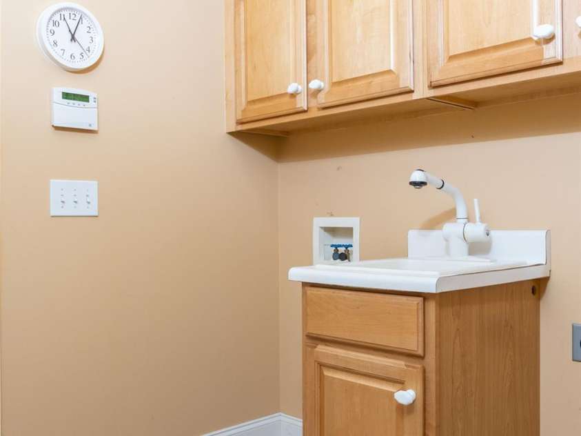 19113 Southport Drive, Cornelius, NC 28031.  MLS# CAR4242642, YatesRealty ID 23990. Laundry Room