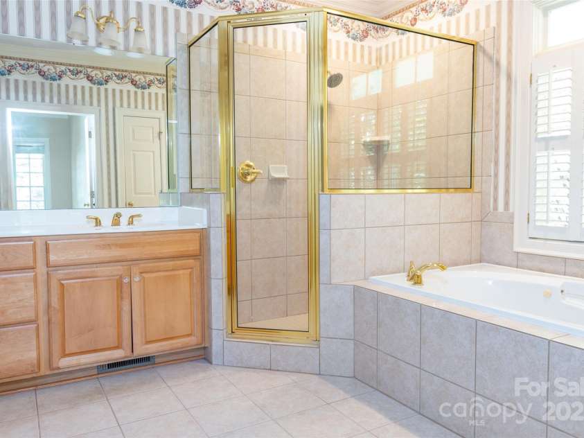 19113 Southport Drive, Cornelius, NC 28031.  MLS# CAR4242642, YatesRealty ID 23990. Primary Bathroom