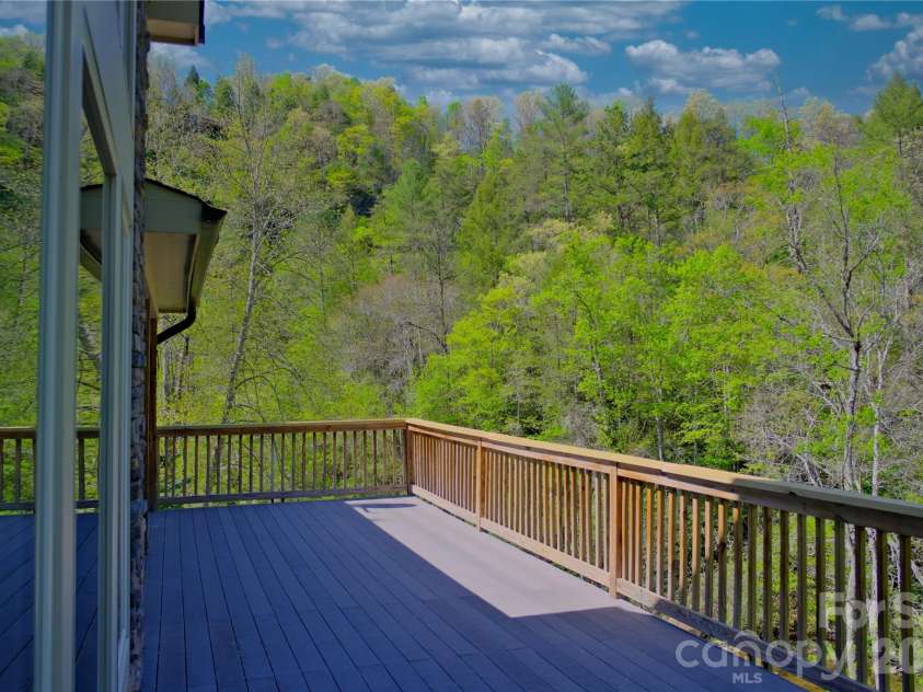 48 Back River Trail, Marshall, NC 28753.  MLS# CAR4362333, YatesRealty ID 23990. Open and covered multi level decks