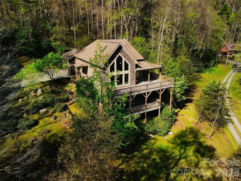 48 Back River Trail, Marshall, NC 28753.  MLS# CAR4362333, YatesRealty ID 23990. Riversong in Bear River Lodge