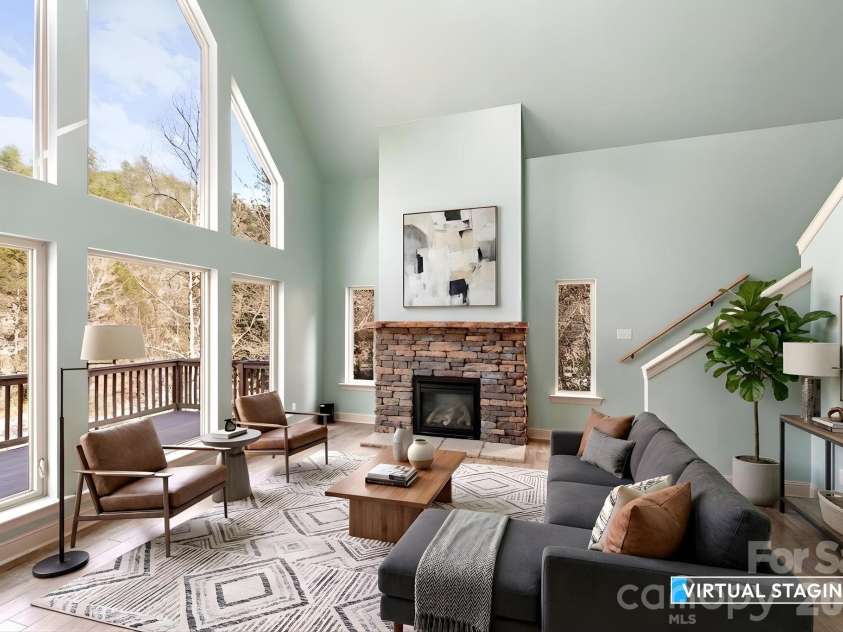 48 Back River Trail, Marshall, NC 28753.  MLS# CAR4362333, YatesRealty ID 23990. Staged Living Room