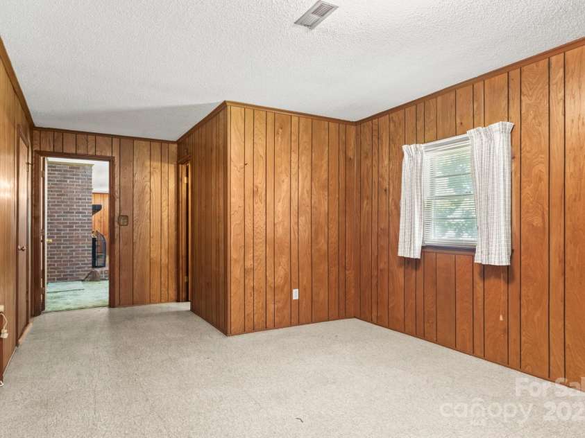 128 Howie Street, Mount Holly, NC 28120.  MLS# CAR4272463, YatesRealty ID 23991. Basement