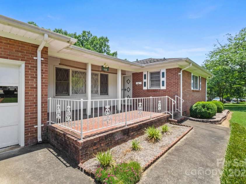 128 Howie Street, Mount Holly, NC 28120.  MLS# CAR4272463, YatesRealty ID 23991. Front Porch