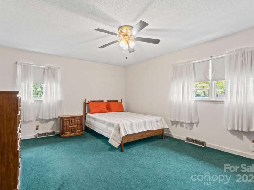 128 Howie Street, Mount Holly, NC 28120.  MLS# CAR4272463, YatesRealty ID 23991. Primary Bedroom