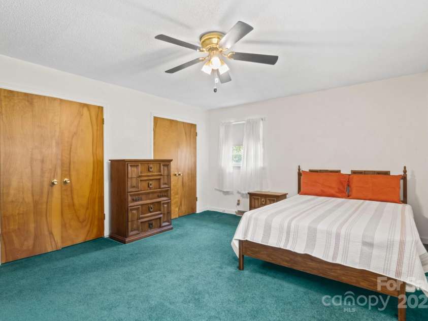 128 Howie Street, Mount Holly, NC 28120.  MLS# CAR4272463, YatesRealty ID 23991. Primary Bedroom