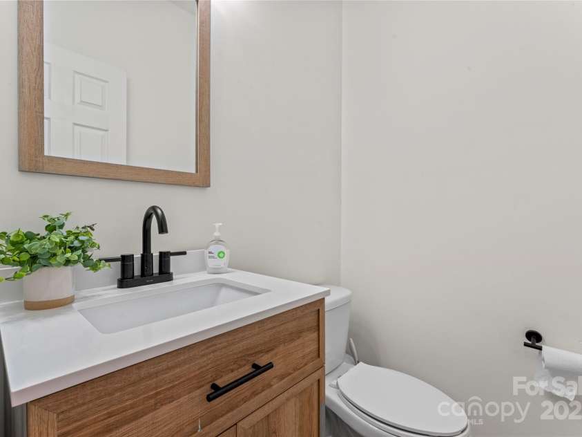 16615 Crimson Sargent Drive, Charlotte, NC 28213.  MLS# CAR4257903, YatesRealty ID 23996. Renovated half bath on main floor