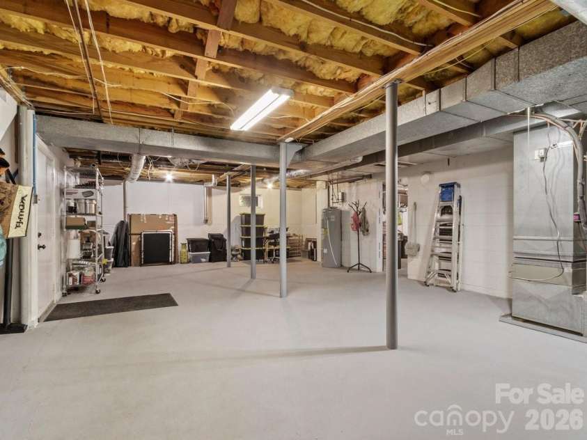 68 Acorn Road, Asheville, NC 28804.  MLS# CAR4372514, YatesRealty ID 23996. Additional unfinished basement