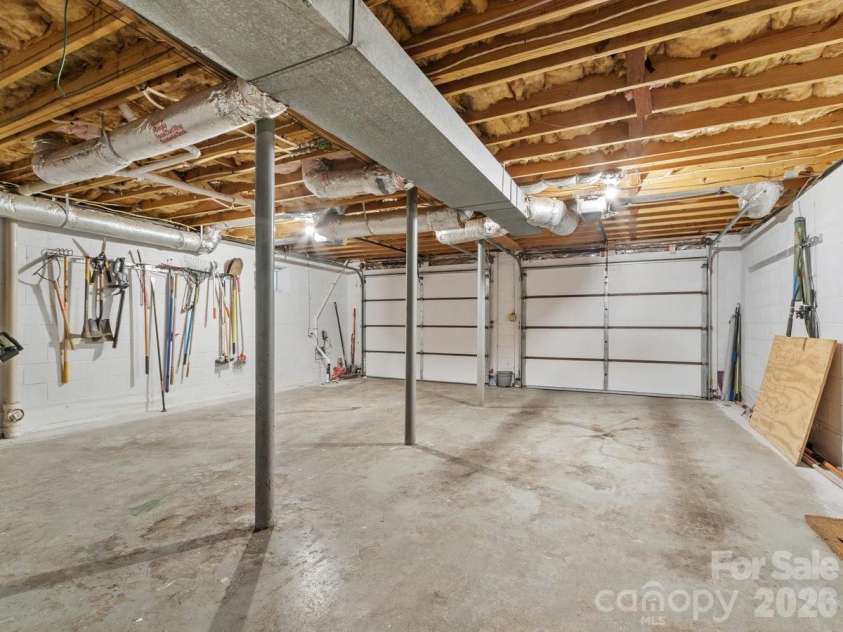 68 Acorn Road, Asheville, NC 28804.  MLS# CAR4372514, YatesRealty ID 23996. Over size garage