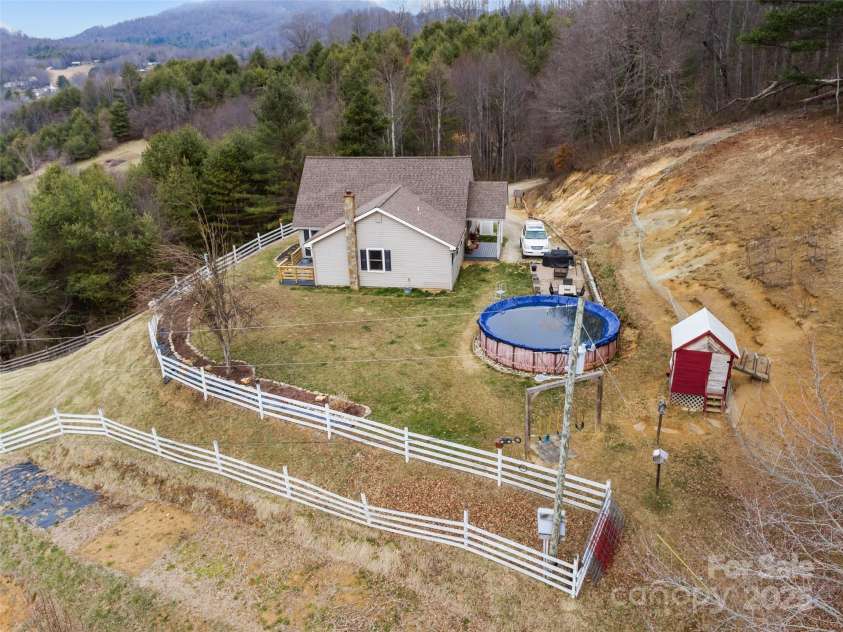 83 Roland Street, Burnsville, NC 28714.  MLS# CAR4228436, YatesRealty ID 2400. 