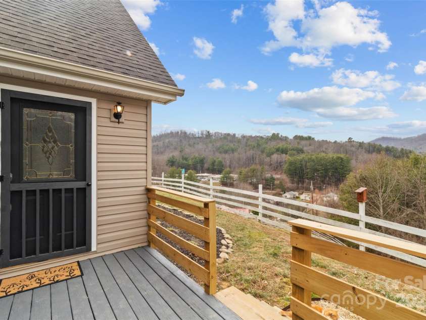 83 Roland Street, Burnsville, NC 28714.  MLS# CAR4228436, YatesRealty ID 2400. Front entrance