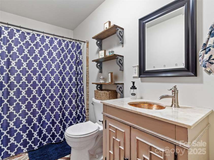 83 Roland Street, Burnsville, NC 28714.  MLS# CAR4228436, YatesRealty ID 2400. Full bathroom