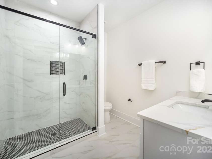 10405 Briarhurst Place, Mint Hill, NC 28227.  MLS# CAR4305265, YatesRealty ID 24000. Full Bath Connected to First Floor Bedroom