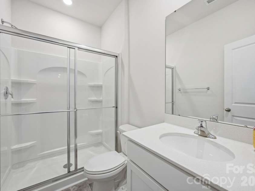 3016 Platinum Pointe Drive, Charlotte, NC 28227.  MLS# CAR4369367, YatesRealty ID 24001. 1st Floor full bath w/walk in shower