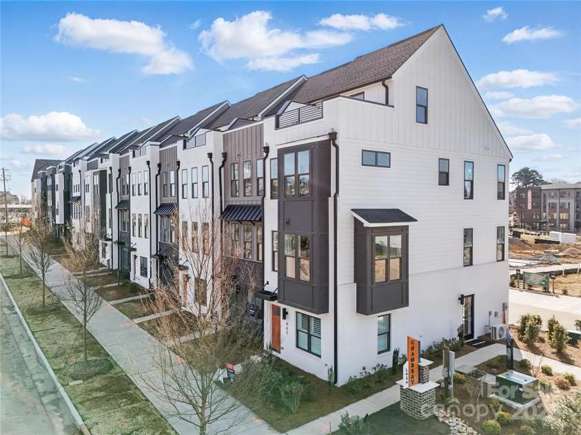 6005 Countess Drive, Charlotte, NC 28217.  MLS# CAR4249197, YatesRealty ID 24002. Enjoy Luxury Living Modern Design New Townhomes With Rooftop Terraces