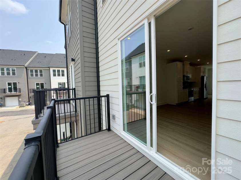 6013 Countess Drive, Charlotte, NC 28217.  MLS# CAR4265938, YatesRealty ID 24003. Balcony on the Main Floor
