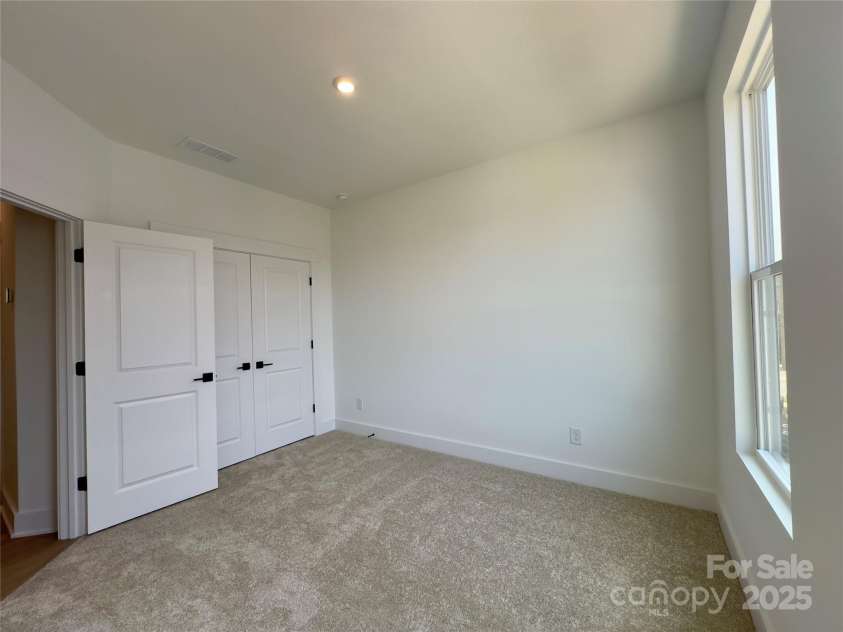 6013 Countess Drive, Charlotte, NC 28217.  MLS# CAR4265938, YatesRealty ID 24003. Guest Bedroom