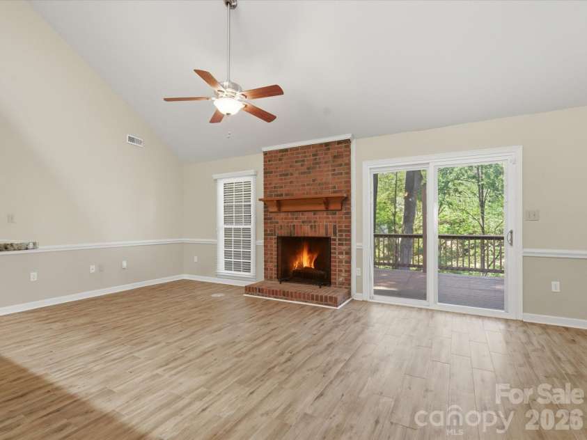 9437 Fairmead Drive, Charlotte, NC 28269.  MLS# CAR4368697, YatesRealty ID 24004. Access to large back deck off of the open great room