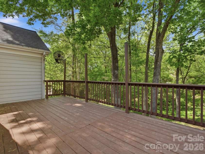 9437 Fairmead Drive, Charlotte, NC 28269.  MLS# CAR4368697, YatesRealty ID 24004. Entertaining here on the deck with this beautiful scenery! 
