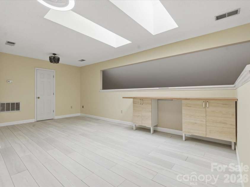 9437 Fairmead Drive, Charlotte, NC 28269.  MLS# CAR4368697, YatesRealty ID 24004. Open loft with 2 skylights also open to the 2 story foyer 