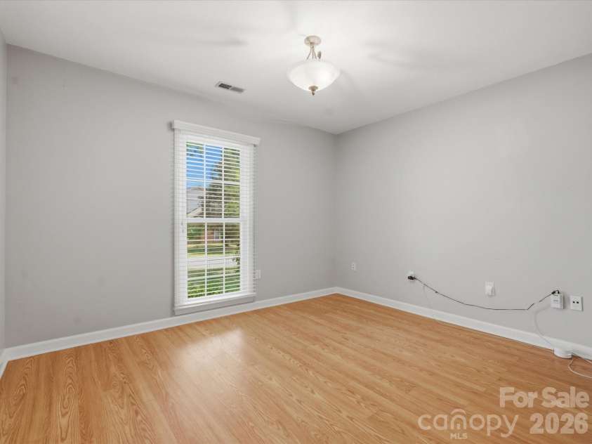 9437 Fairmead Drive, Charlotte, NC 28269.  MLS# CAR4368697, YatesRealty ID 24004. Spare Bedroom 1