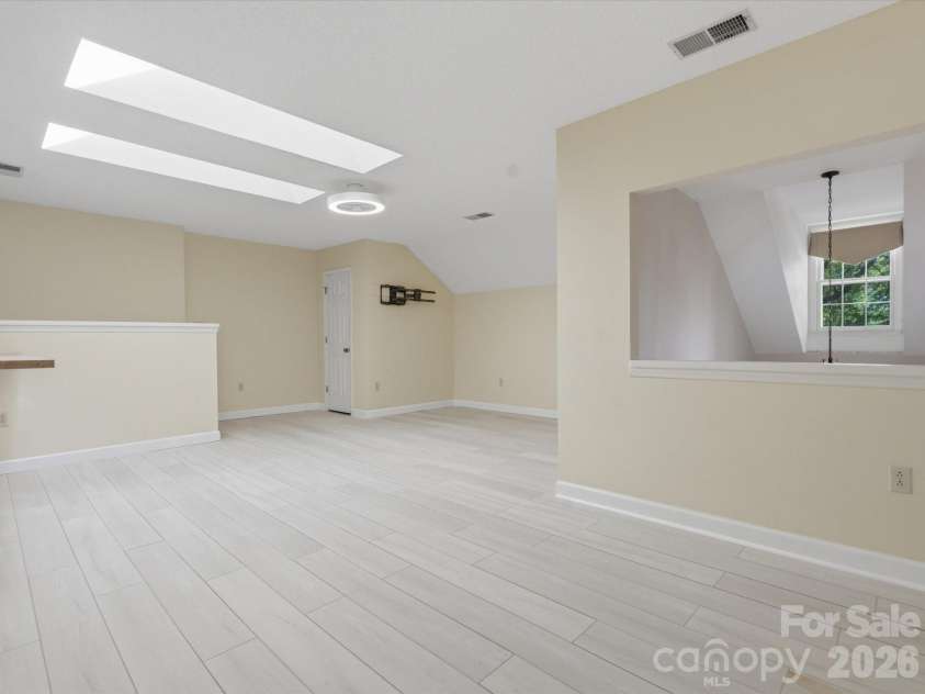 9437 Fairmead Drive, Charlotte, NC 28269.  MLS# CAR4368697, YatesRealty ID 24004. Tons of storage in the attic closets! 