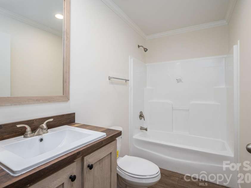 808 Eagleview Lane, Lawndale, NC 28090.  MLS# CAR4359481, YatesRealty ID 24005. Guest Bathroom