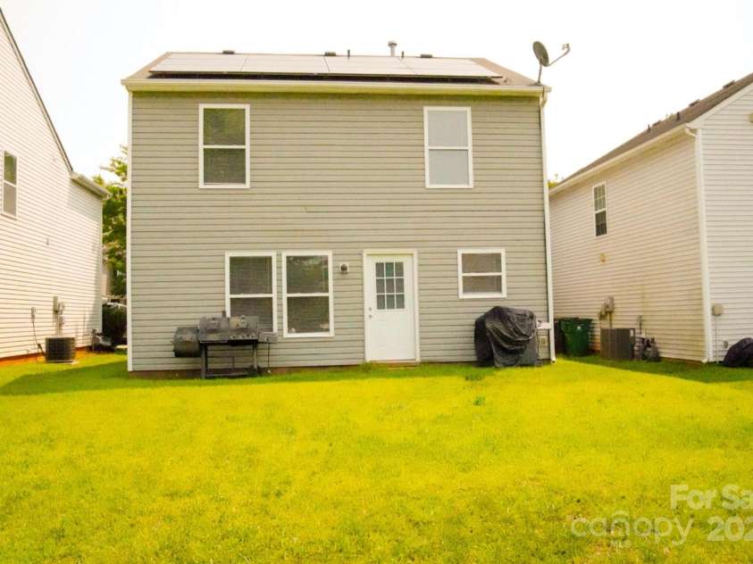 7619 Monarch Birch Lane, Charlotte, NC 28215.  MLS# CAR4273922, YatesRealty ID 24006. Backyard