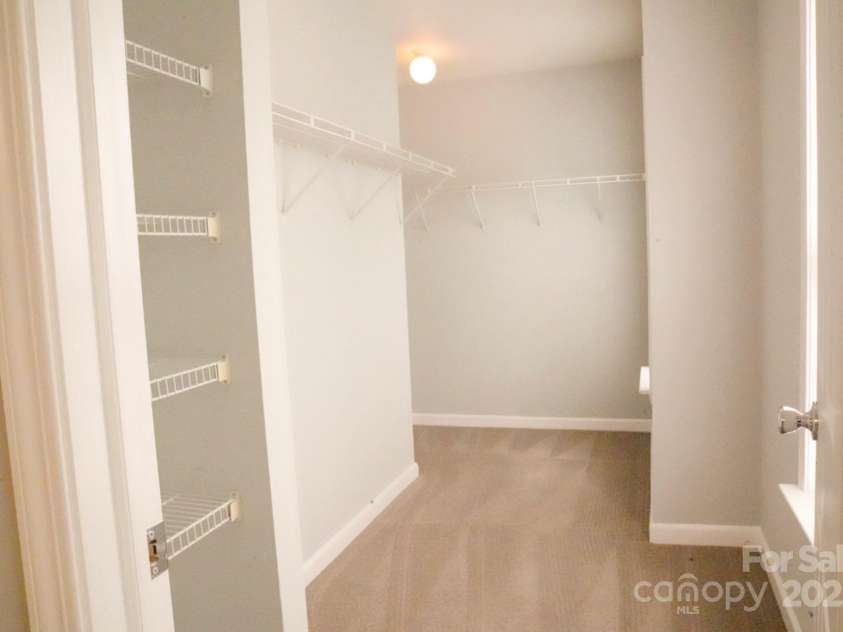 7619 Monarch Birch Lane, Charlotte, NC 28215.  MLS# CAR4273922, YatesRealty ID 24006. Primary Closet