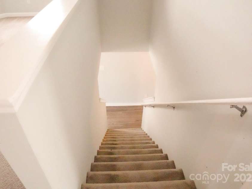 7619 Monarch Birch Lane, Charlotte, NC 28215.  MLS# CAR4273922, YatesRealty ID 24006. Stairs