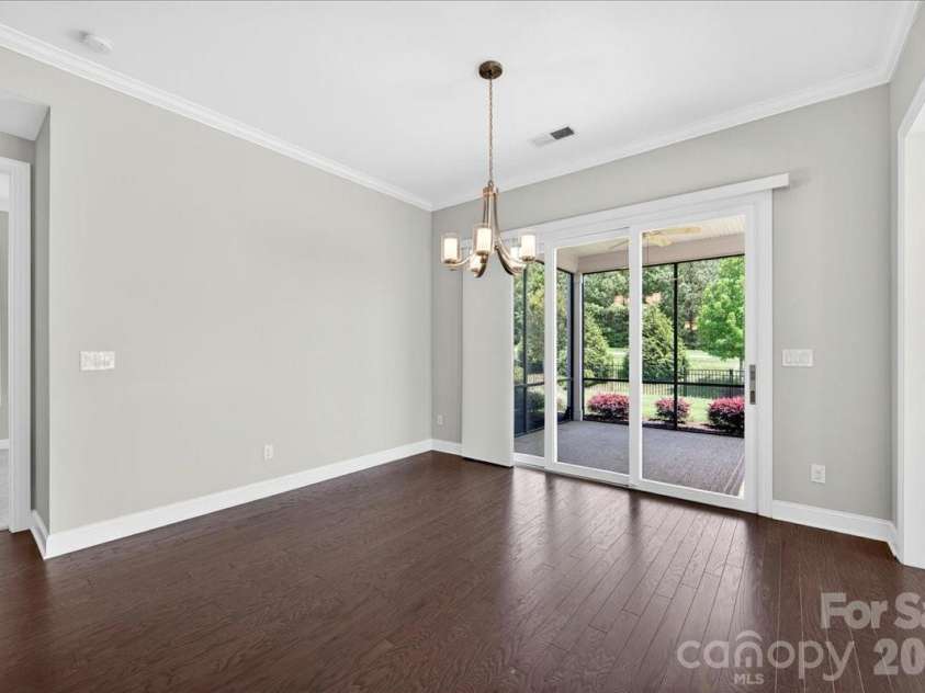 249 Stone Mountain Way, Denver, NC 28037.  MLS# CAR4380432, YatesRealty ID 24016. Breakfast Area w/ 9Ft Rolling Wall to Screened-In Patio