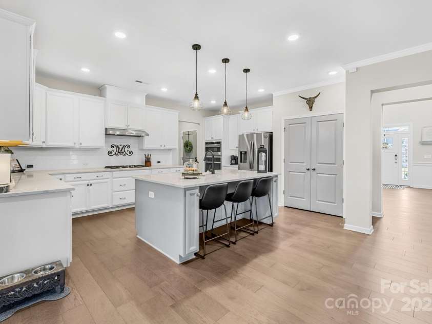 7313 Glenroe Drive, Huntersville, NC 28078.  MLS# CAR4239222, YatesRealty ID 24016. Kitchen island w/Calcutta countertops